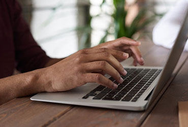 Courses Person Using Macbook 1